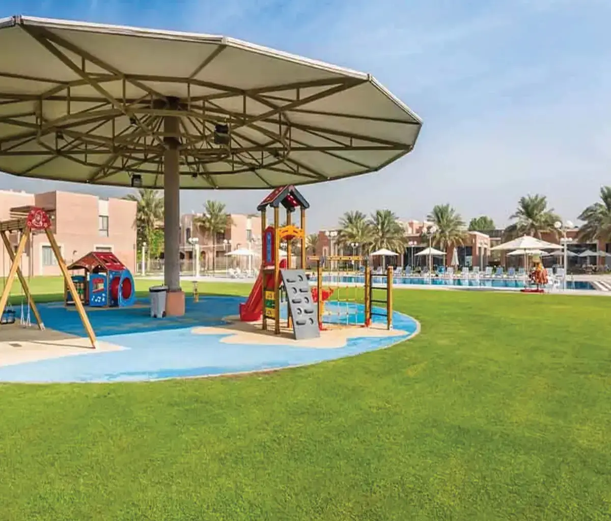 Outdoor communal spaces and walking paths near the waterfront