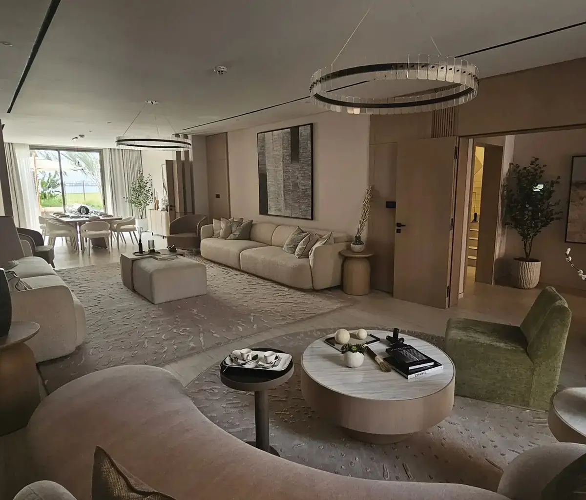 Spacious living room with traditional accents and arched windows