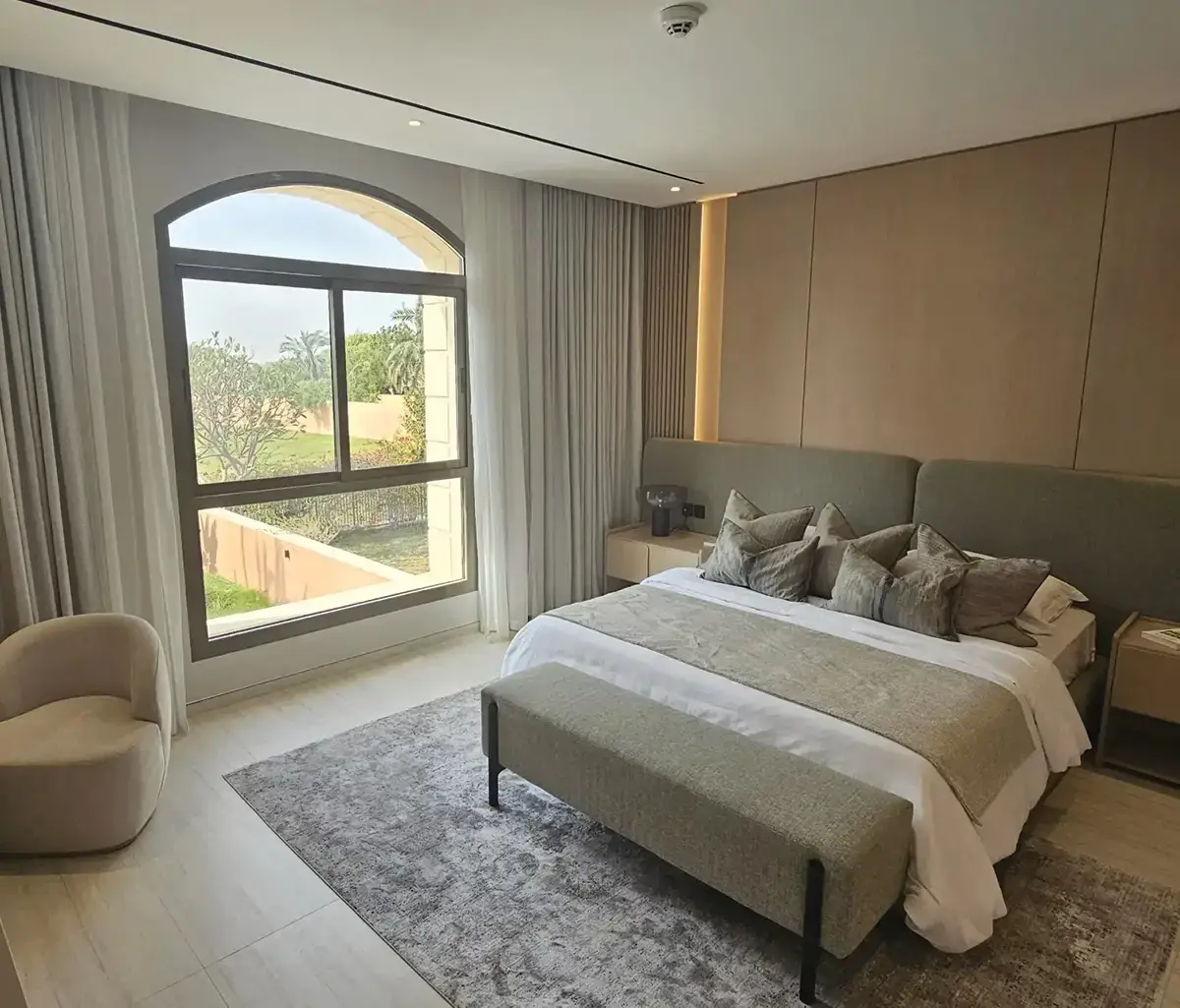 Open kitchen with ample storage and marble countertops in Mangrove Village villa